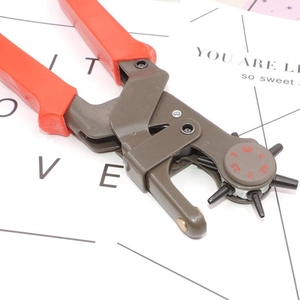 Detail view of rotating head with 2mm to 4.5mm size scales on leather hole puncher tool