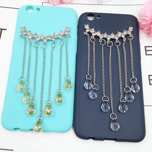 Luxe crystal tassel pendant phone cases in mint and navy blue with rhinestones