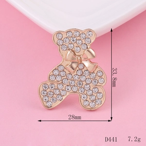 Sparkling rhinestone encrusted bear charm with gold bow for DIY jewelry and phone cases