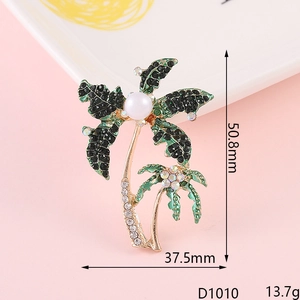 Detalle del broche de cocotero tropical con dimensiones e incrustaciones de cristal brillante