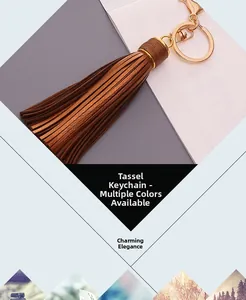 Detailed close-up of a brown leather tassel keychain with polished gold metal hardware