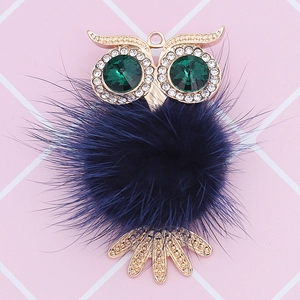 Creative owl ornament with green rhinestone eyes and blue faux fur ball body