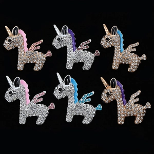 Sparkling unicorn rhinestone accessories in silver and gold with colorful enamel finish