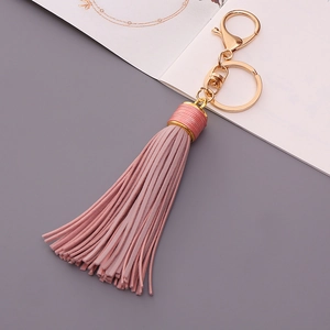 Pink leather tassel keychain with golden lobster clasp and ring for car keys and bags