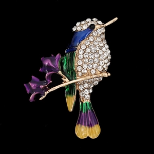 Exquisite hummingbird brooch with colorful enamel and sparkling rhinestones on branch