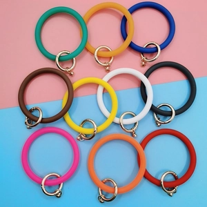 Set of ten colorful silicone wristlet keychains with golden metal spring clasps