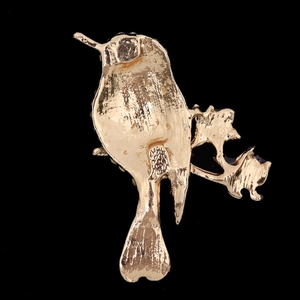 Golden bird on branch metal accessory with detailed cast texture for DIY jewelry
