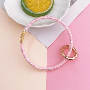 Pink glitter transparent soft glue wristlet keychain with golden spring ring clasp