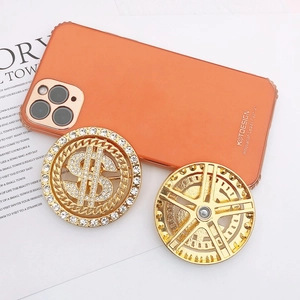 Golden spinning dollar sign phone socket with sparkling rhinestones for DIY cases