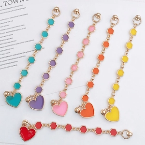 DIY colorful heart and hexagon charms for phone cases in six vibrant enamel colors