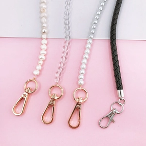 Creative DIY pearl and woven leather phone charm chains with metal lobster clasps