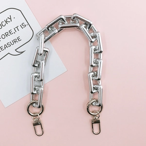 Macro shot of silver rectangular link chain strap with metallic lobster clasp closure