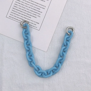 Close-up of light blue acrylic thick chain strap with silver metal spring ring buckles