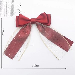Handmade burgundy satin and mesh ribbon bow hair accessory measuring 160mm by 115mm