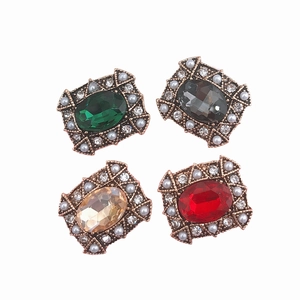 Set of vintage oval gemstones with faux pearls and rhinestones on bronze settings