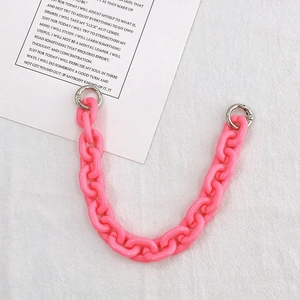 Close-up of pink acrylic chain with silver spring rings for phone cases and bags