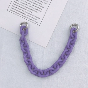 Macro detail of purple acrylic chunky chain with silver metal spring ring buckles