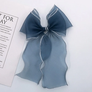 Navy blue lace mermaid bow hair accessory with double-layered mesh and wavy stitching