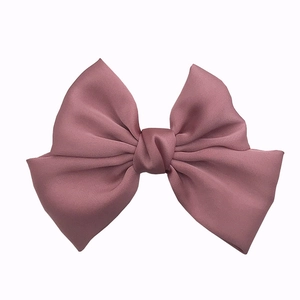 Handmade silk ribbon bow accessory in dusty rose for DIY hair clips and phone cases