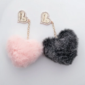 Faux rabbit fur heart keychains in pink and grey with crystal I Love You engraving