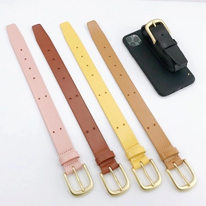 Close-up of leather phone straps in five colors with golden buckles and adjustment holes