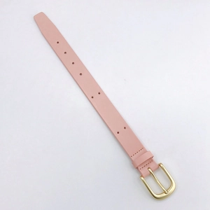 Detailed macro view of pink leather wrist strap with gold buckle and precise stitching