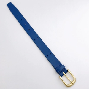 Close-up of a dark blue leather wrist strap with gold metal buckle and stitching