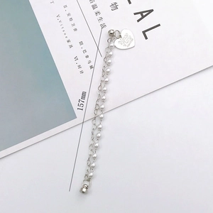 Double-layer 157mm bracelet featuring white faux pearls and hollow heart chain links