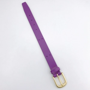 Close-up of purple leather DIY wrist strap with gold metal buckle and adjustment holes