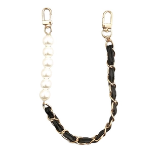 Fashionable black leather and gold chain strap with white faux pearls and lobster clasps