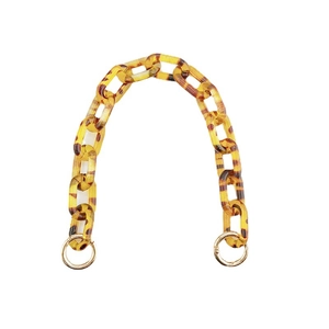 Amber leopard print acrylic handbag chain with golden metal rings on white background