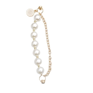 Elegant pearl bracelet with golden chain and floral charm on a clean white background