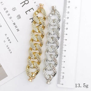 Massives Curb-Kettenarmband in Gold und Silber mit Strasssteinen und Magnetverschluss