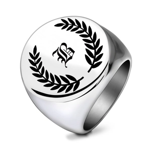 Vintage silver stainless steel signet ring featuring Gothic letter B and laurel leaf pattern
