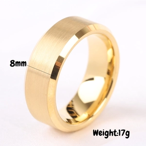 Detailed view of 8mm gold stainless steel ring with brushed finish and polished beveled edges