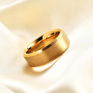 Minimalist 8mm gold tungsten carbide ring with brushed surface and polished beveled edges