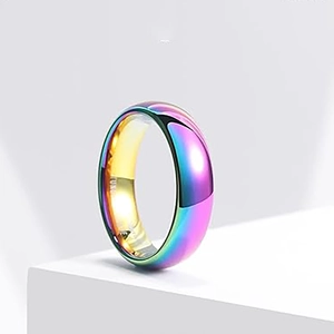 Macro detail of rainbow plated tungsten ring band with mirror polished finish