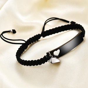 Minimalist black woven couple bracelet with engraved heart metal bar and silver charm