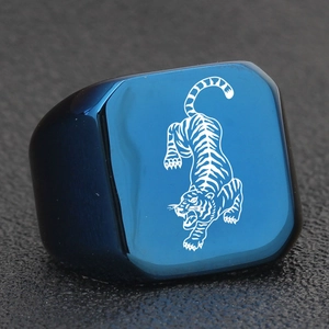 Detailed view of square blue stainless steel signet ring with engraved tiger totem