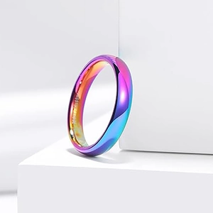 Macro shot of colorful iridescent tungsten carbide ring showing polished finish and material mark