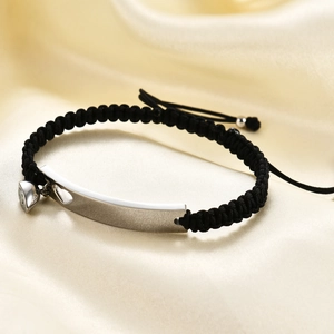 Braided magnetic couple bracelets with polished stainless steel plates and heart charm