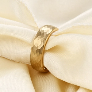 Minimalist 6mm golden stainless steel ring with a unique hammered honeycomb pattern finish