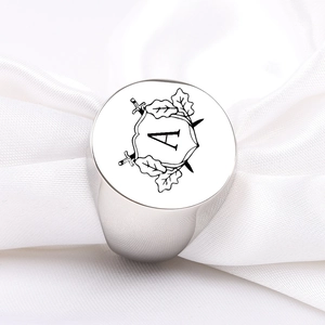 Polished silver stainless steel signet ring with engraved heraldic shield and letter A