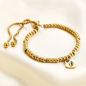 Bracciale a sfere in acciaio placcato oro 14K con ciondolo cuore lettera D regolabile