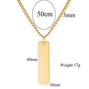 Detail view of 40mm gold bar pendant necklace with specific size and weight annotations