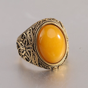 Bague vintage 22mm en acier inoxydable avec pierre jaune et détails floraux gravés