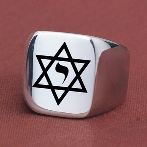 Detail of laser engraved Star of David and Hebrew rune on stainless steel signet ring