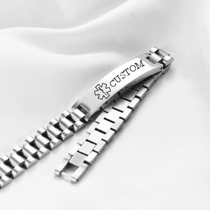Macro shot of polished stainless steel medical ID bracelet with adjustable link strap