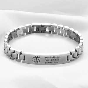 Macro detail of medical alert bracelet with personalized engraving on stainless steel plate