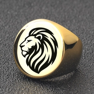 Macro shot of 22mm gold stainless steel ring with laser engraved lion head detail